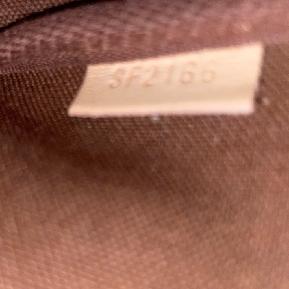 LV Mini Pochette that will make any wardrobe fabulous! - Picture 10 of 12